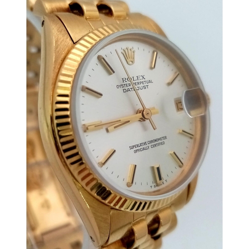 162 - An 18K Gold Rolex Oyster Perpetual Datejust Ladies Watch. 18K gold bracelet and case - 31mm. Silver ... 