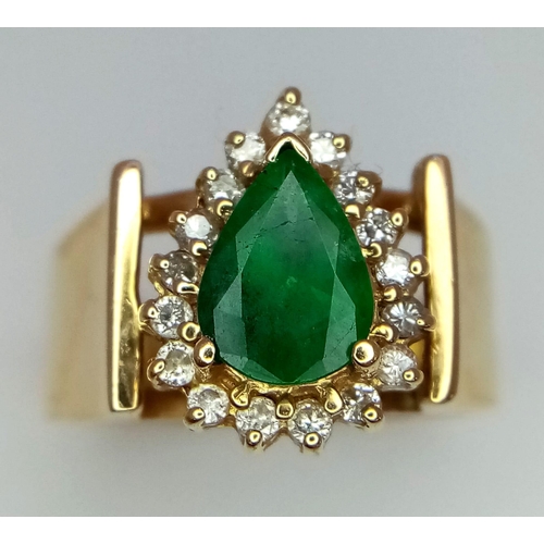 200 - A 14k yellow gold diamond and emerald cluster ring. 6.2g total weight. size N. (dia:0.34ct/emerald:1... 