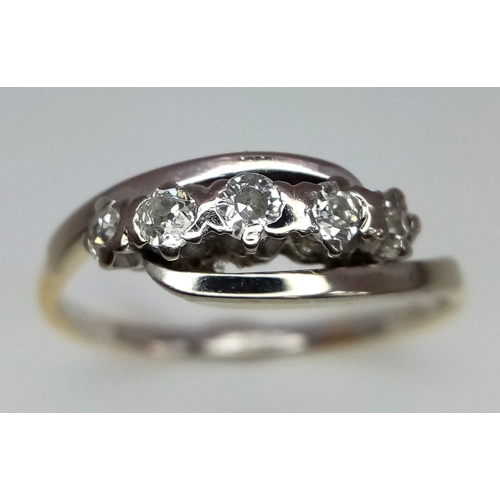 512 - A 9k yellow gold diamond set 5 stone ring.  3.3g total weight. Size Q (dia:0.20ct)