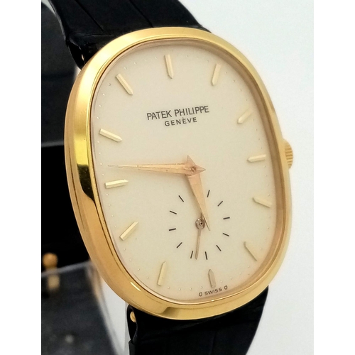 65 - A Vintage Patek Phillipe 18K Gold Gents Watch. Original black leather strap with 18k gold buckle. 18... 