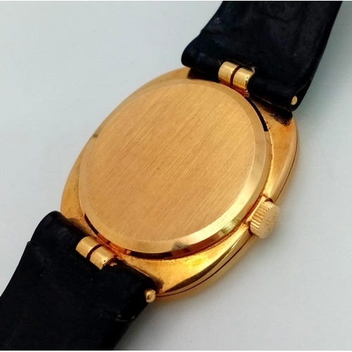 65 - A Vintage Patek Phillipe 18K Gold Gents Watch. Original black leather strap with 18k gold buckle. 18... 