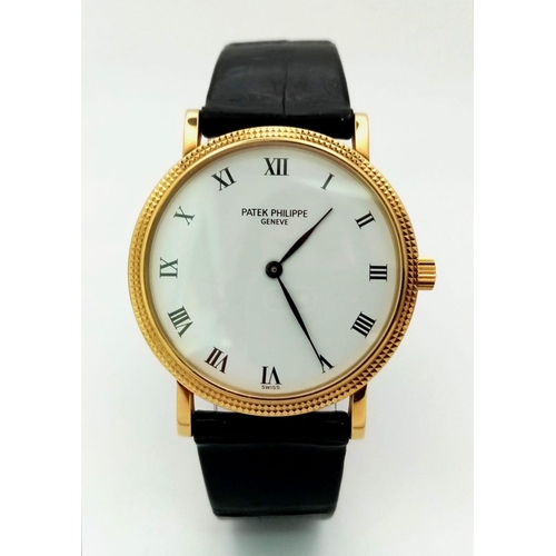 653 - An Understated 18K Gold Patek Phillipe Calatrava Gents Watch. Black crocodile strap with gold clasp.... 