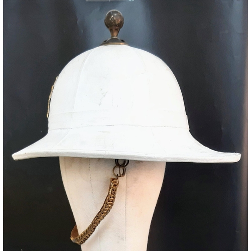 460 - 1960 Dated Royal Marines Band Pith Helmet. Compete with liner, badge, chin strap and top pommel. Ver... 