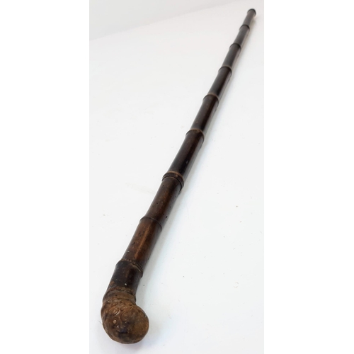 781 - Antique Bamboo 'Root-Ball End' Sword Walking Stick.

The hidden blade tapers to the end and measures... 