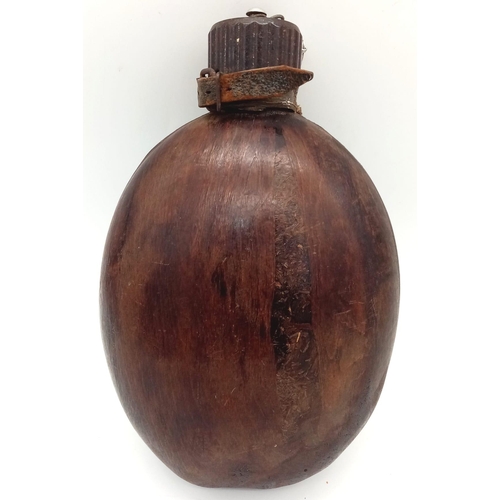 866 - 1943 Dated German Tropical Husk Covered Water Bottle.