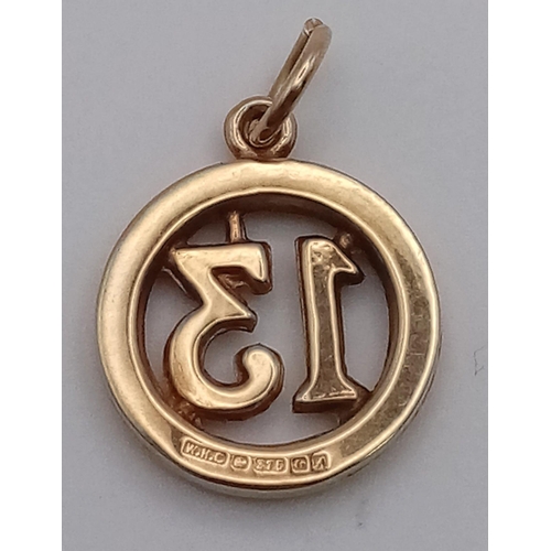 909 - 9kt Yellow Gold '13' Charm.
W: 1.1g