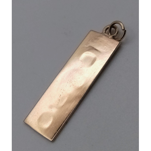 926 - A 9K Yellow Gold Fully Hallmarked Ingot Pendant. 2cm length, 1.2g total weight.