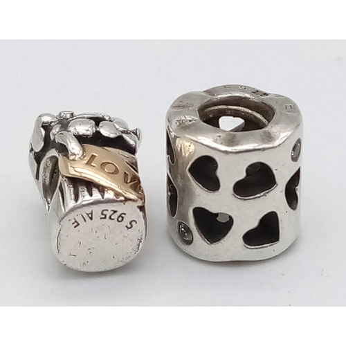 964 - Two Sterling Silver Pandora charms flower bouquet. Engraved 'LOVE' and open work love hearts. Wt 5.2... 