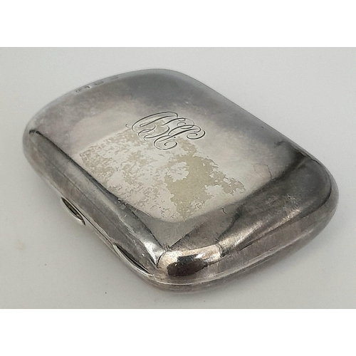 492 - An Antique Sterling Silver Small Purse. Birmingham hallmarks. 73g total weight. 8cm x 5cm.