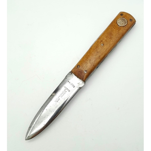 687 - WW2 German Multi Bladed Utility Knife. N.S.K.K Button has been let into the handle. Maker: Hugo Köll... 