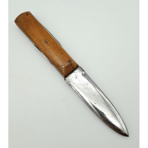 687 - WW2 German Multi Bladed Utility Knife. N.S.K.K Button has been let into the handle. Maker: Hugo Köll... 