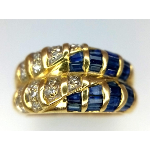 132 - 18kt Yellow Gold Diamond & Sapphire Ring.
W: 5.4g
Size L