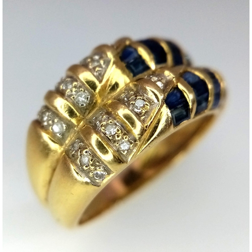 132 - 18kt Yellow Gold Diamond & Sapphire Ring.
W: 5.4g
Size L