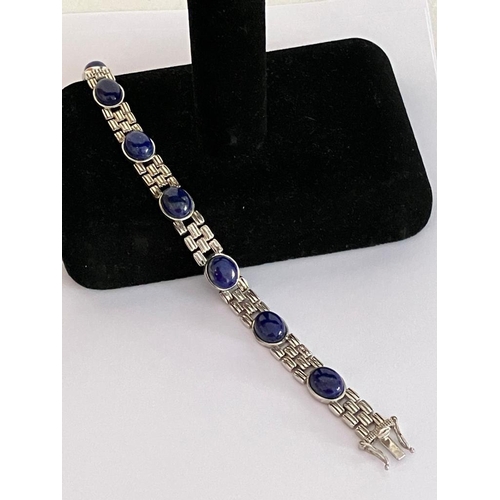 399 - A fabulous LAPIS LAZULI set SILVER BRACELET. Full UK hallmark.19 cm. Approx 30 grams.