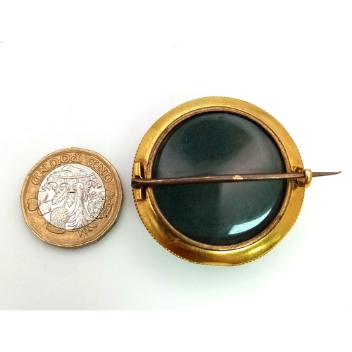 69 - An 18kt Yellow Gold Vintage Mourning Brooch Stone Set and Enamel work.
W: 15.5g
Diameter: 3.5cm
Beau... 