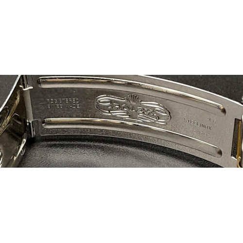 185 - A ROLEX SUBMARINER WATCH WITH STUNNING BLUE DIAL AND MATCHING BLUE BEZEL , BI-METAL STRAP . EVERY MA... 