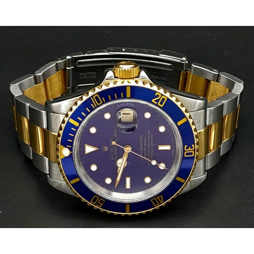185 - A ROLEX SUBMARINER WATCH WITH STUNNING BLUE DIAL AND MATCHING BLUE BEZEL , BI-METAL STRAP . EVERY MA... 