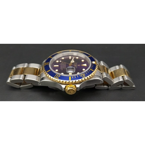 185 - A ROLEX SUBMARINER WATCH WITH STUNNING BLUE DIAL AND MATCHING BLUE BEZEL , BI-METAL STRAP . EVERY MA... 