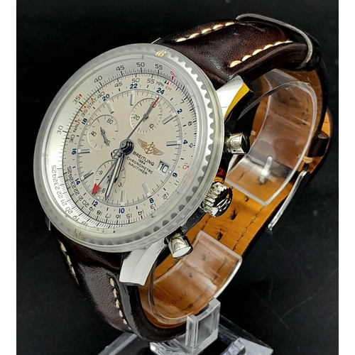 11 - A Breitling Navitimer World Automatic Gents Watch. Brown leather strap. Stainless steel case - 47mm.... 