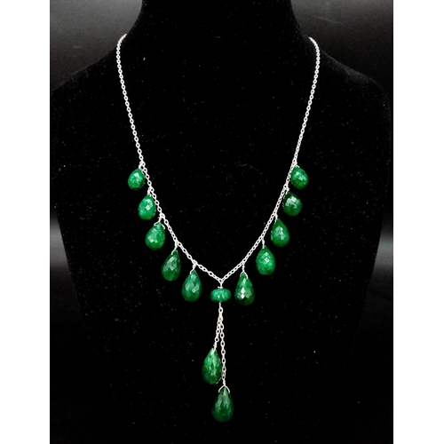 1144 - A 925 Silver Necklace with Briolite Cut Emerald Drops.
44cm in length, 5.5cm middle drop, 77ctw emer... 