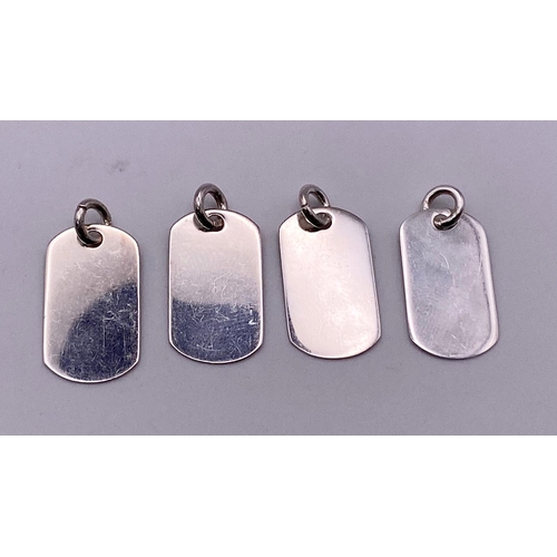 1147 - Four Sterling silver pendants with various religious quotes. Wt 5.1g.