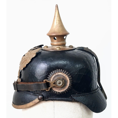 19 - WW1 1895 Model Imperial German Pickelhaube with chinstrap and cockles. Unit marked to the 70th (Rhen... 