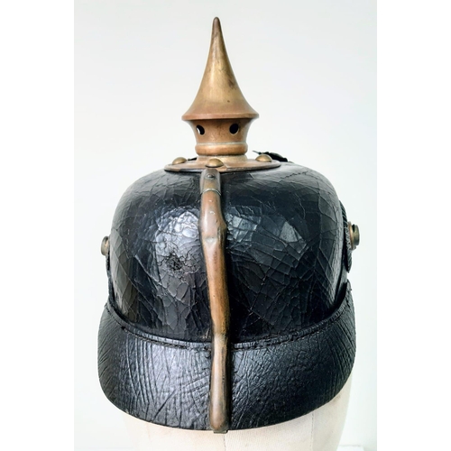 19 - WW1 1895 Model Imperial German Pickelhaube with chinstrap and cockles. Unit marked to the 70th (Rhen... 