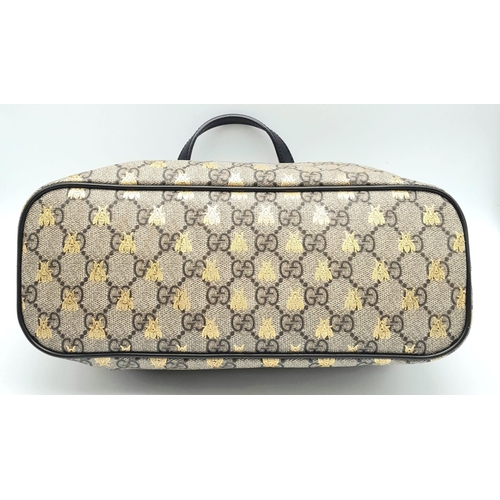 199 - GUCCI GG Supreme Bee Satchel

This satchel features a coated canvas body, flat leather handles, a de... 