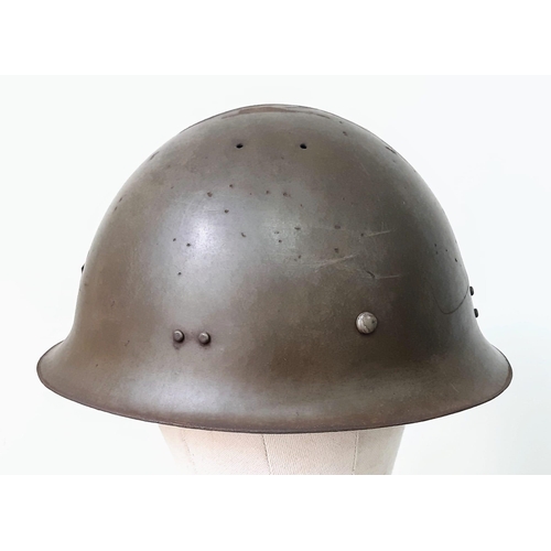 229 - WW2 Japanese Type 90 Helmet with star insignia and liner.