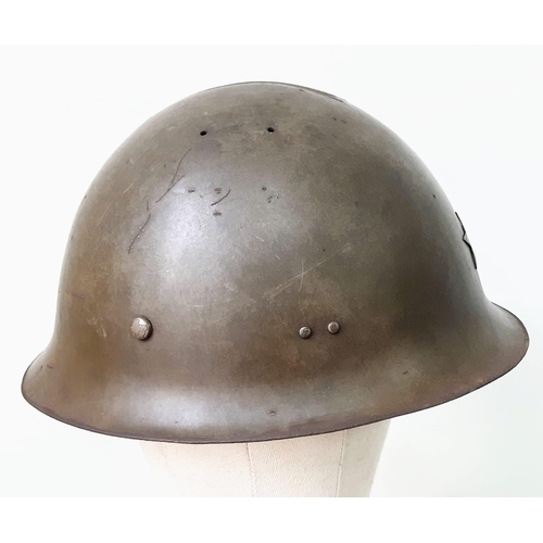 229 - WW2 Japanese Type 90 Helmet with star insignia and liner.