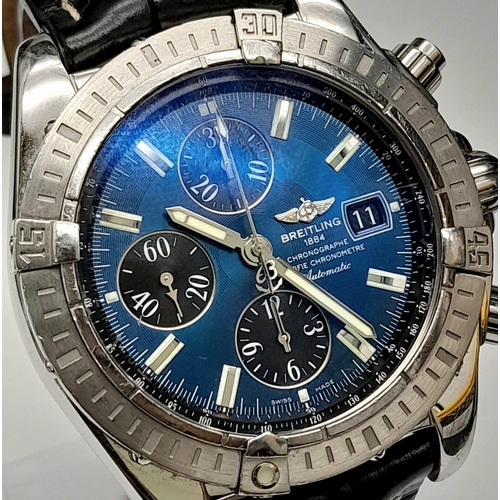 32 - A Breitling Chronograph Automatic Gents Watch. Black leather strap. Stainless steel case - 44mm. Blu... 