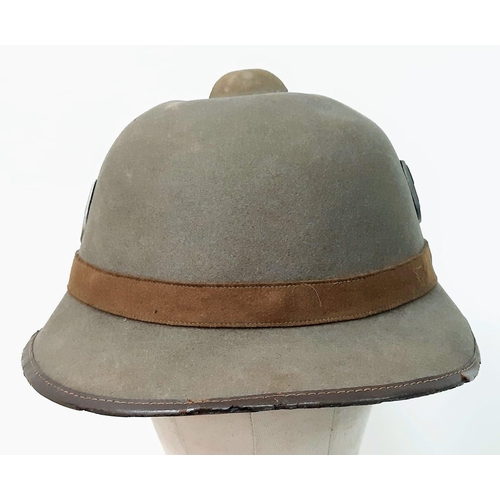 40 - A WW2 2nd Pattern German Africa Corps Pith Helmet with insignia.