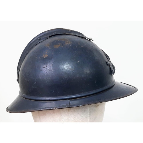 601 - WW1 French Mle 1915 Pattern Adrian Helmet badged to the Artillery. With original paint and liner.