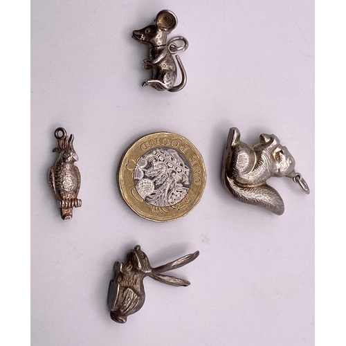 803 - Four various Sterling Silver animal themed charm/pendants. Including rabbit, mouse/rat, squirrel and... 