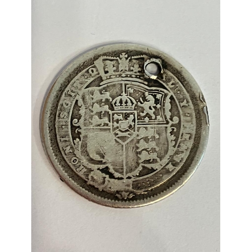 931 - SILVER GEORGE III SHILLING 1820.  Condition, fair/fine. Small hole where previously used as a fob.