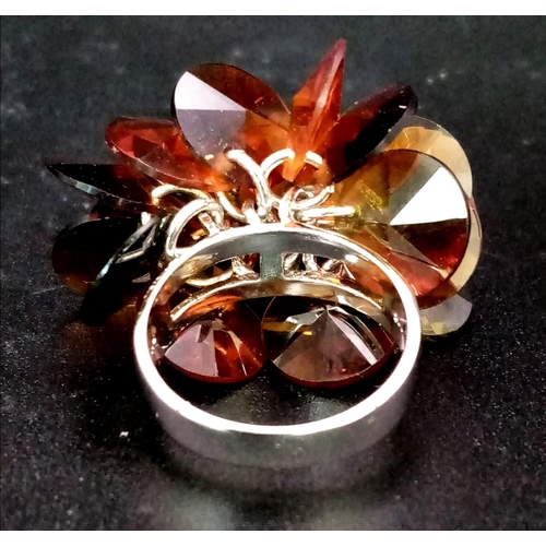 1133 - Sterling silver fancy ring. Wt 9.9g.