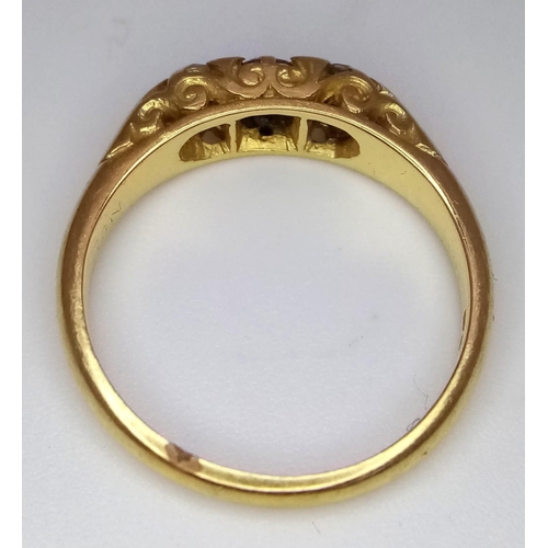 122 - An 18 K yellow gold ring with trilogy of round cut diamonds. Size: M1/2, weight: 3.8 g. 14223