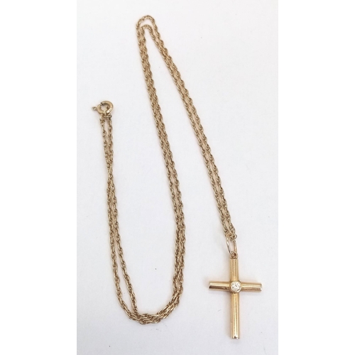 170 - A 9K ROSE GOLD CROSS PENDANT WITH SMALL DIAMOND ON A 48cms 9K GOLD CHAIN .2.8gms