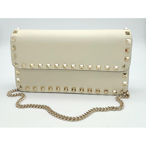 269 - Valentino Garavani Rockstud Chain Leather Cross-Body Bag.
Stylish white leather with muted gold hard... 