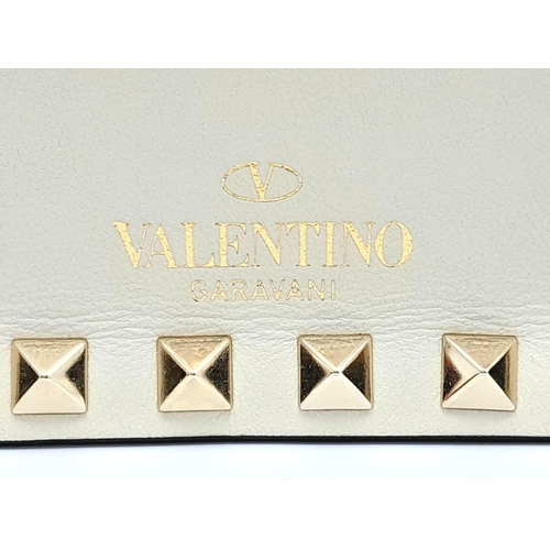 269 - Valentino Garavani Rockstud Chain Leather Cross-Body Bag.
Stylish white leather with muted gold hard... 