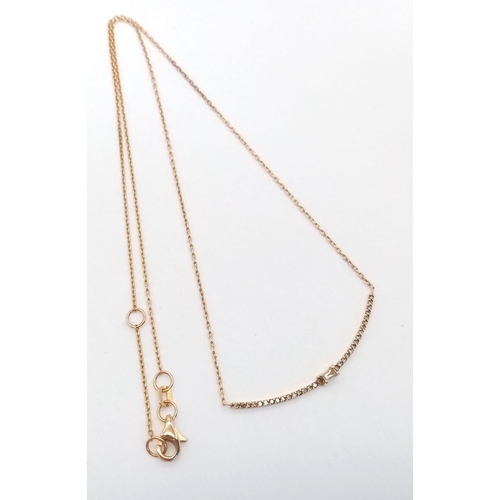 297 - An 18 K yellow gold chain necklace with a band of diamonds.  Length: 44cm, weight: 2.7 g. With guara... 