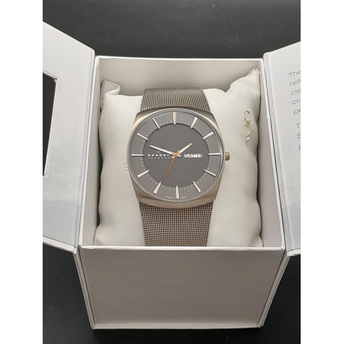 495 - A Vintage Skagen of Denmark Quartz Gents Watch. Stainless steel strap and case - 39mm. Two-tone grey... 