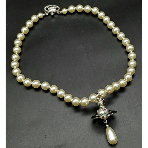 562 - A Vivienne Westwood Cultured Pearl Necklace with Drop Pendant. 38cm length. Comes with original VW p... 