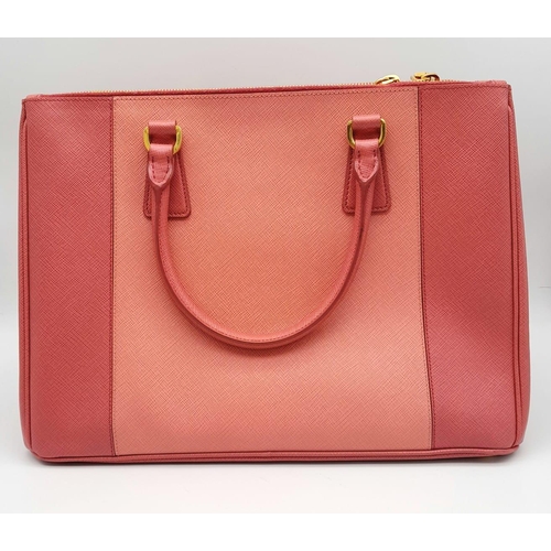 78 - A Prada Two-Tone Pink Galleria Bag. Saffiano leather exterior. Features expandable side wings with p... 