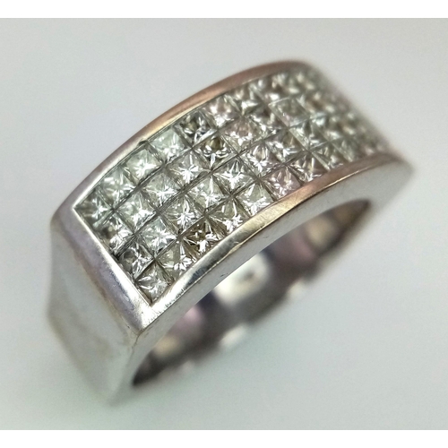 88 - An 18 K white gold ring with four diamond bands. Size: P, weight: 12.3 g. 14272