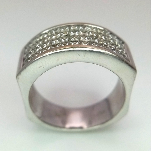 88 - An 18 K white gold ring with four diamond bands. Size: P, weight: 12.3 g. 14272