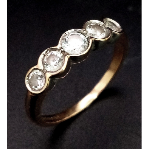 93 - A VINTAGE 9K GOLD RING HAVING 5 DIAMONDS SET IN PLATINUM .  2.45gms   size N