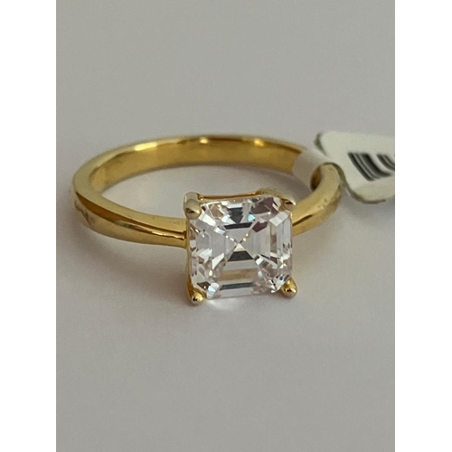 973 - 1 Carat Clear Gemstone, Princess Cut and  Mounted in a SILVER RING. Ring has been gilded to appear a... 