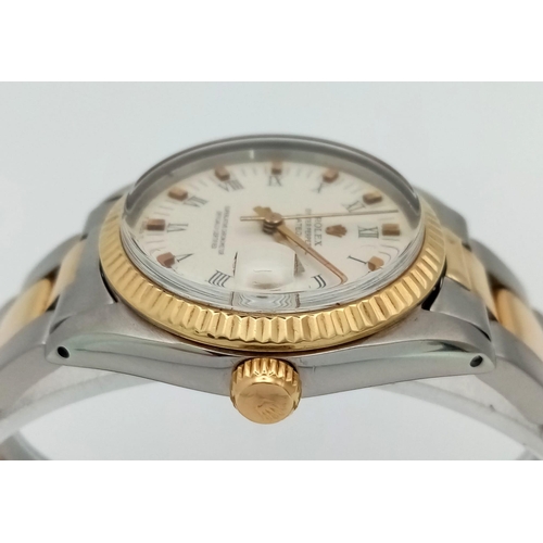 1075 - A BI-METAL ROLEX OYSTER PERPETUAL DATEJUST MIDSIZE WATCH. Bi-metal bracelet and case - 31 mm. 18K ye... 