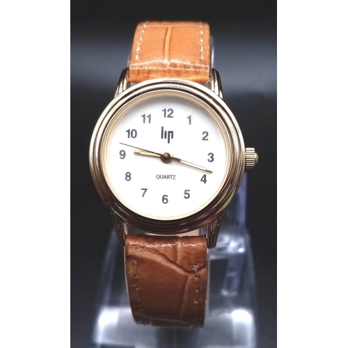 1153 - An Unworn Ladies HP Fond Acier Sedagyl Quartz Watch 28mm Including Crown. Tan Leather Strap, Comes w... 